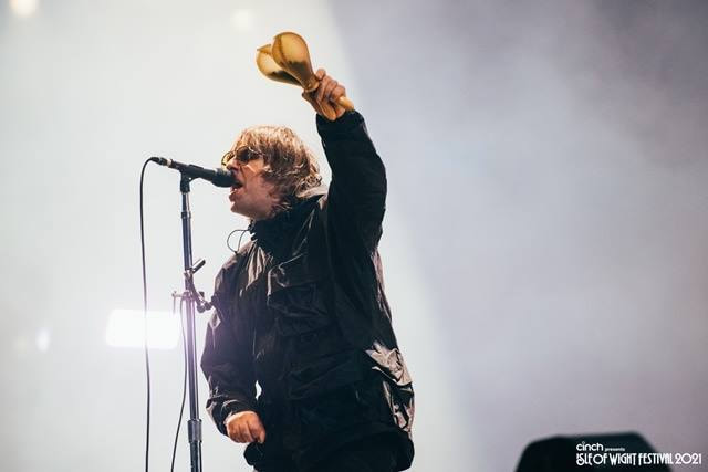 Liam gallagher with instrument at Isle of Wight Festival 2021
