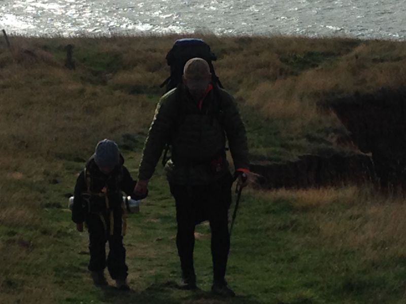 Two walkers on the cliffs near Compton Bay