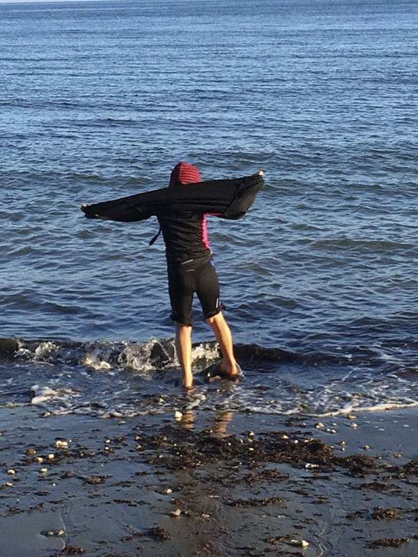 Child paddling the sea near Shanklin