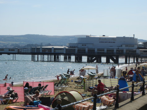 Sandown beach and pier during summer