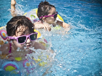 Children swimming at a holiday park